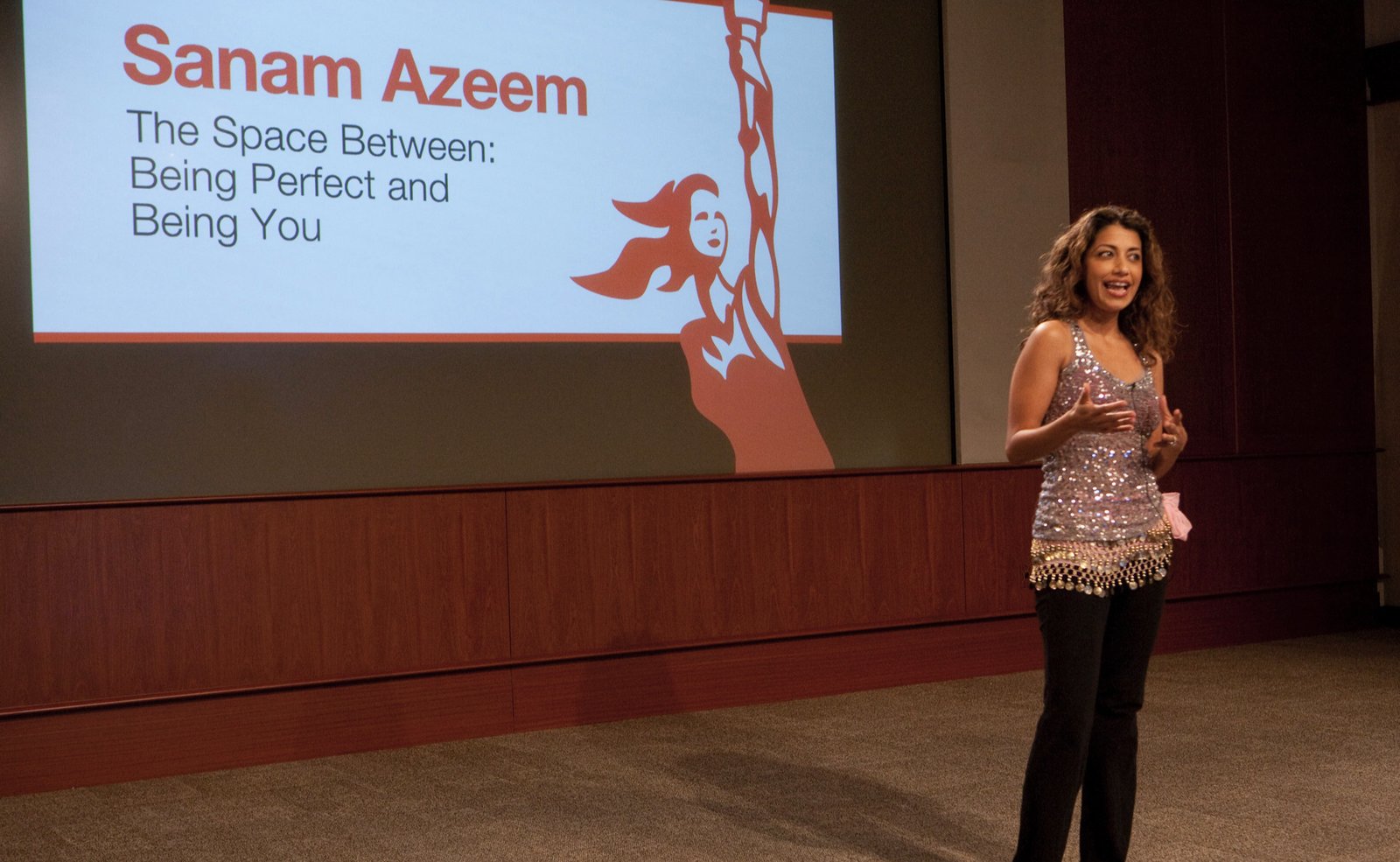 Sanam Azeem speaking on stage